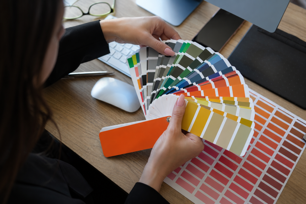 Curiso owner working with a Pantone book